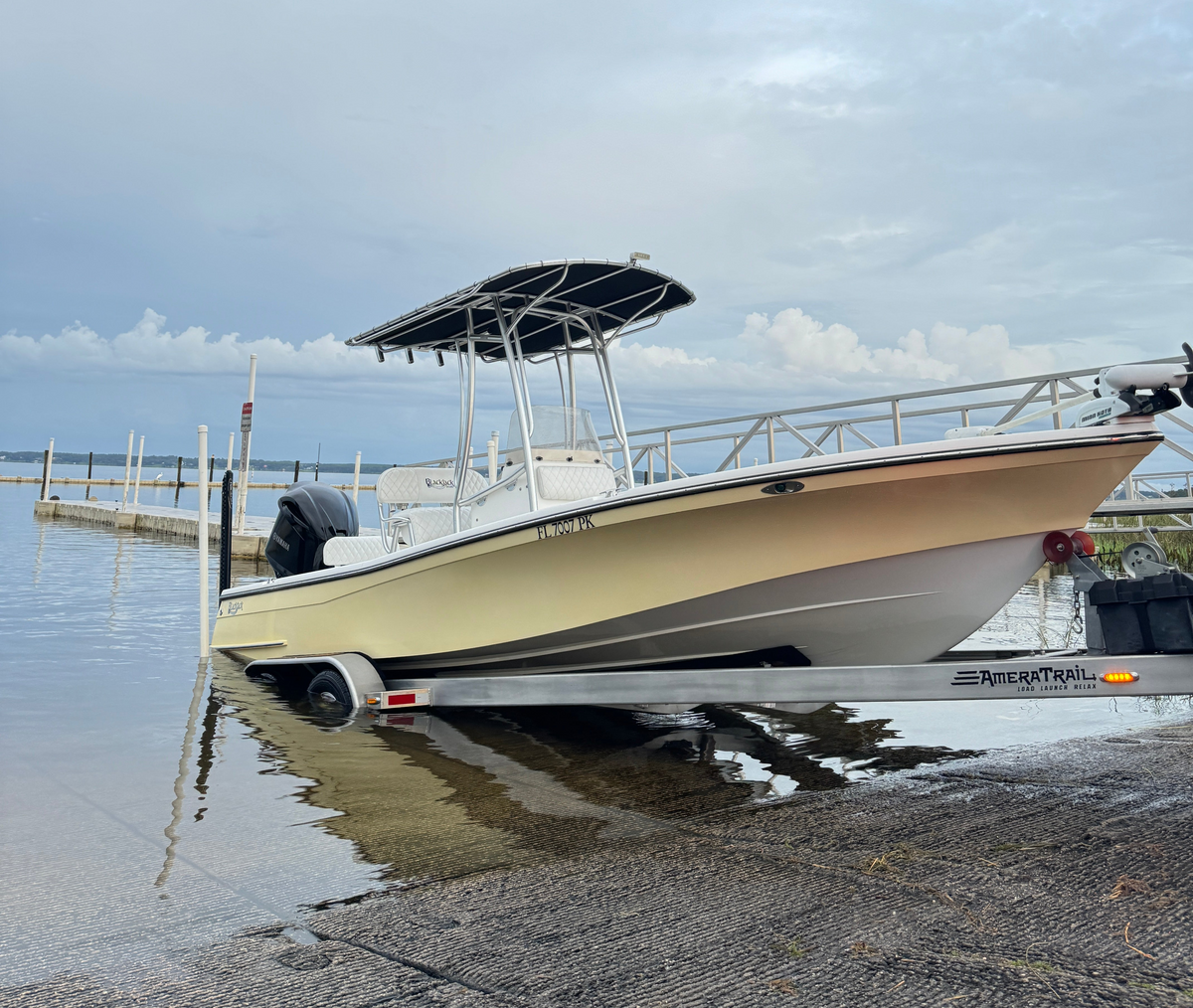 Boater loading watercraft onto a trailer
