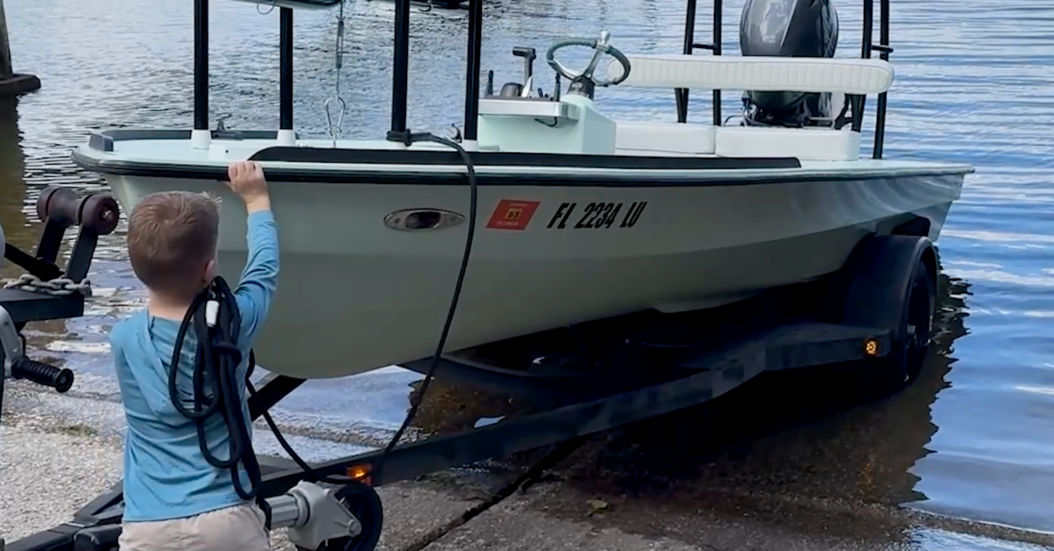 Load video: 10-year old launches a boat with boat bunk wax